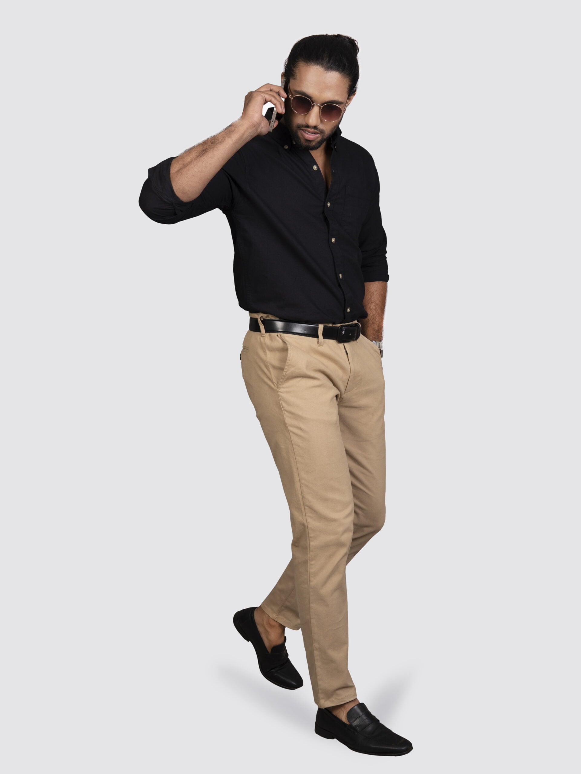 Black shirt beige pants on sale